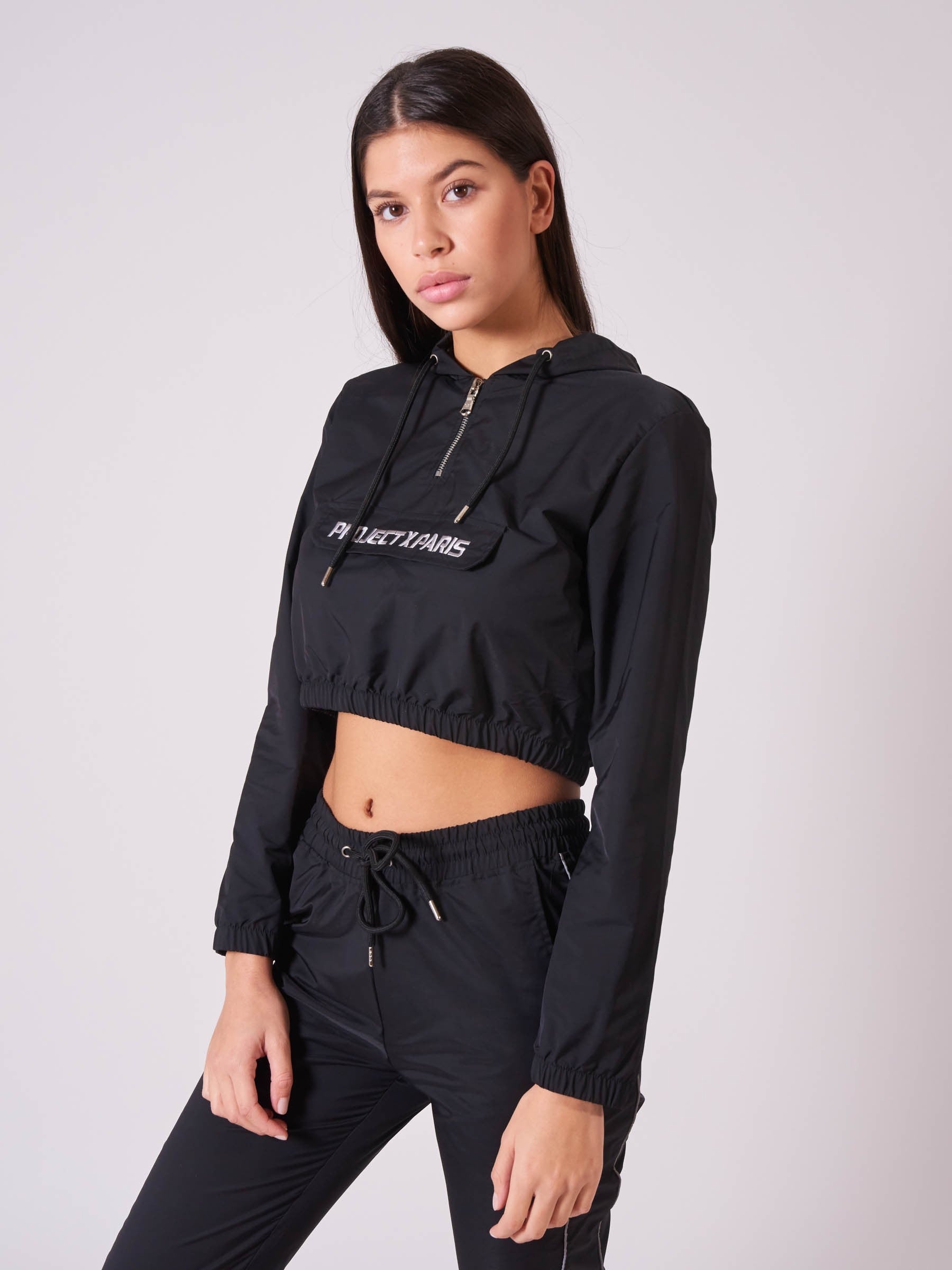 Coupe-vent court logo