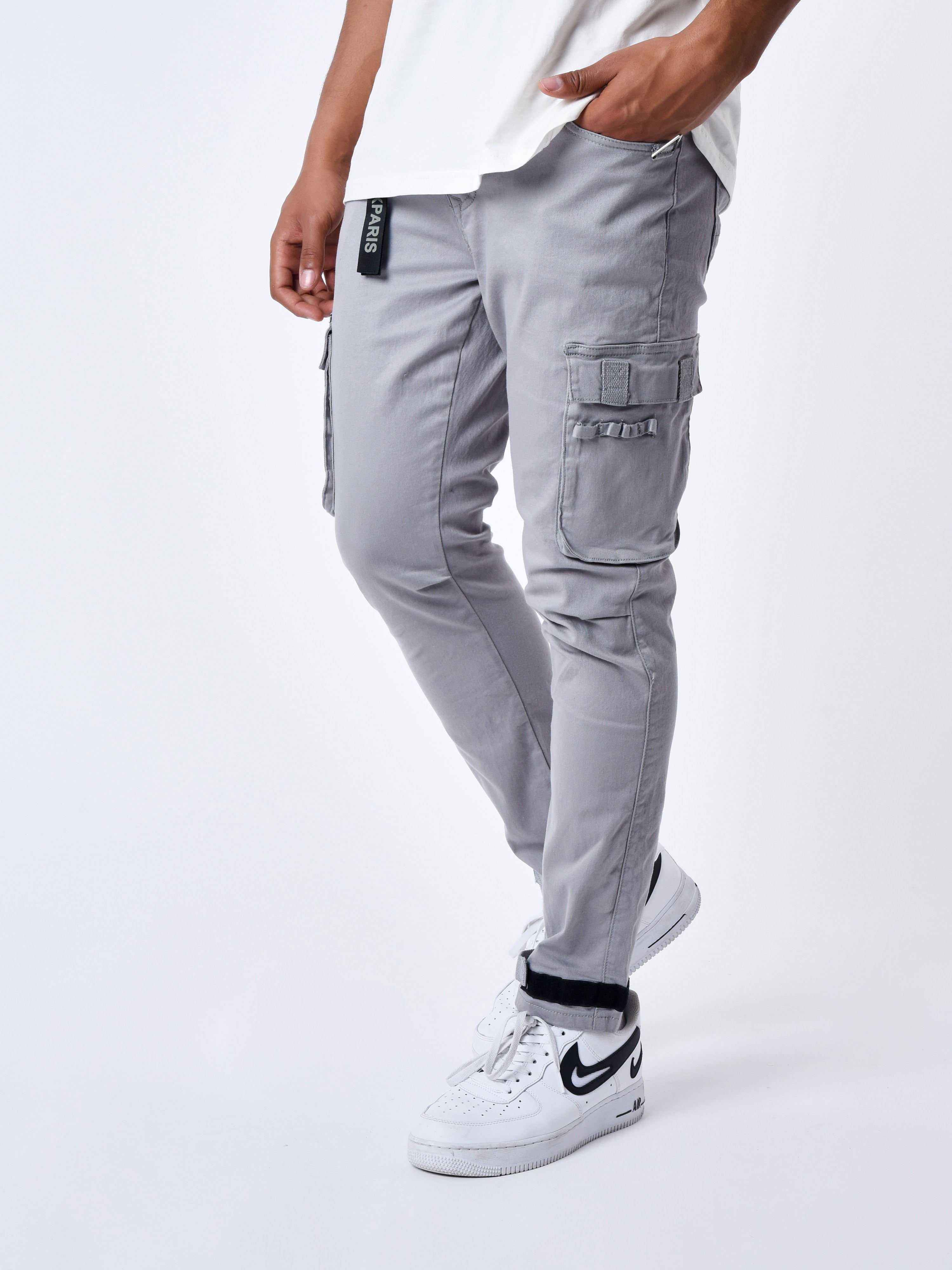 Jean Cargo poches et sangle de resserrement en bas