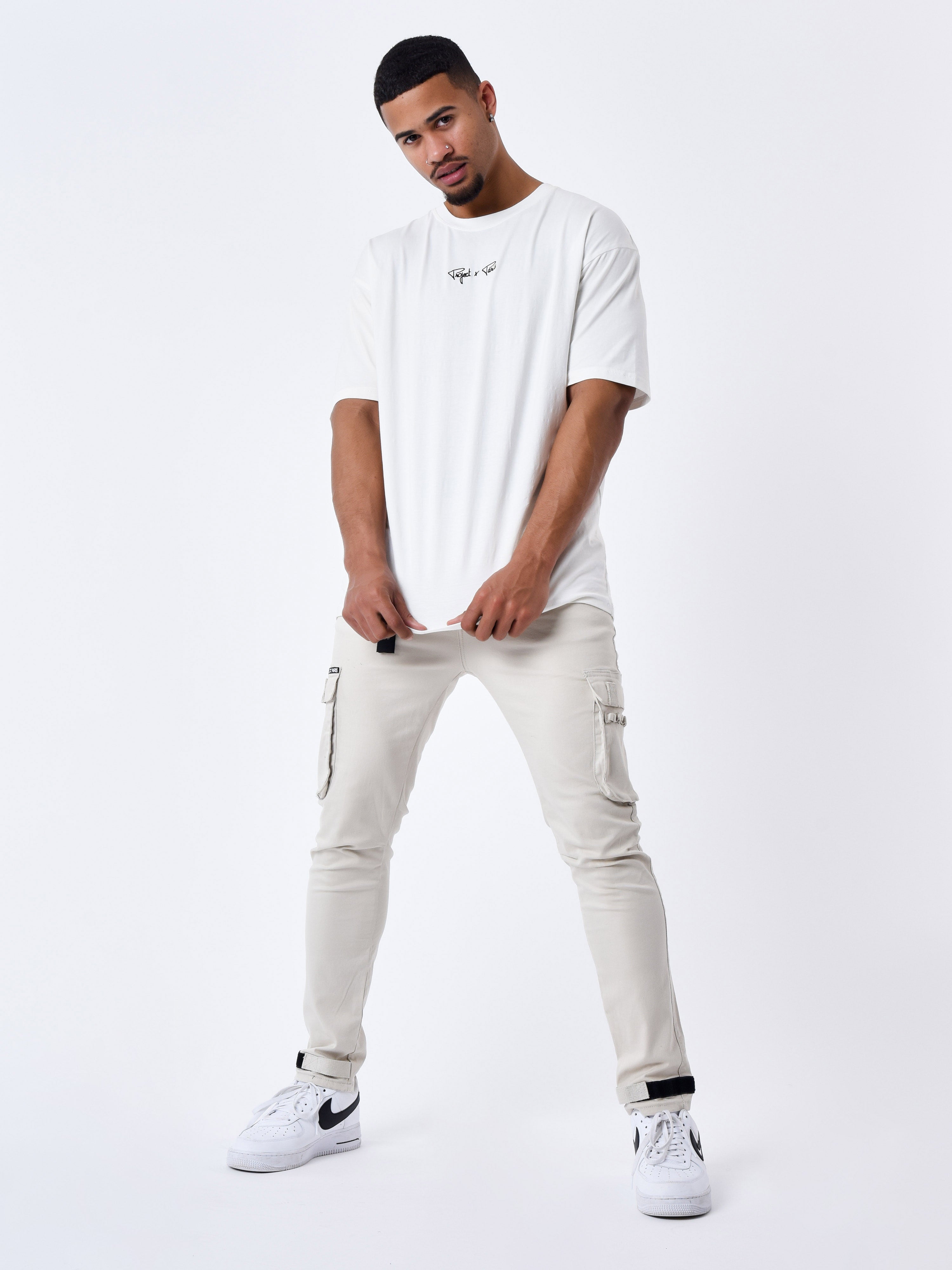 Jean Cargo poches et sangle de resserrement en bas