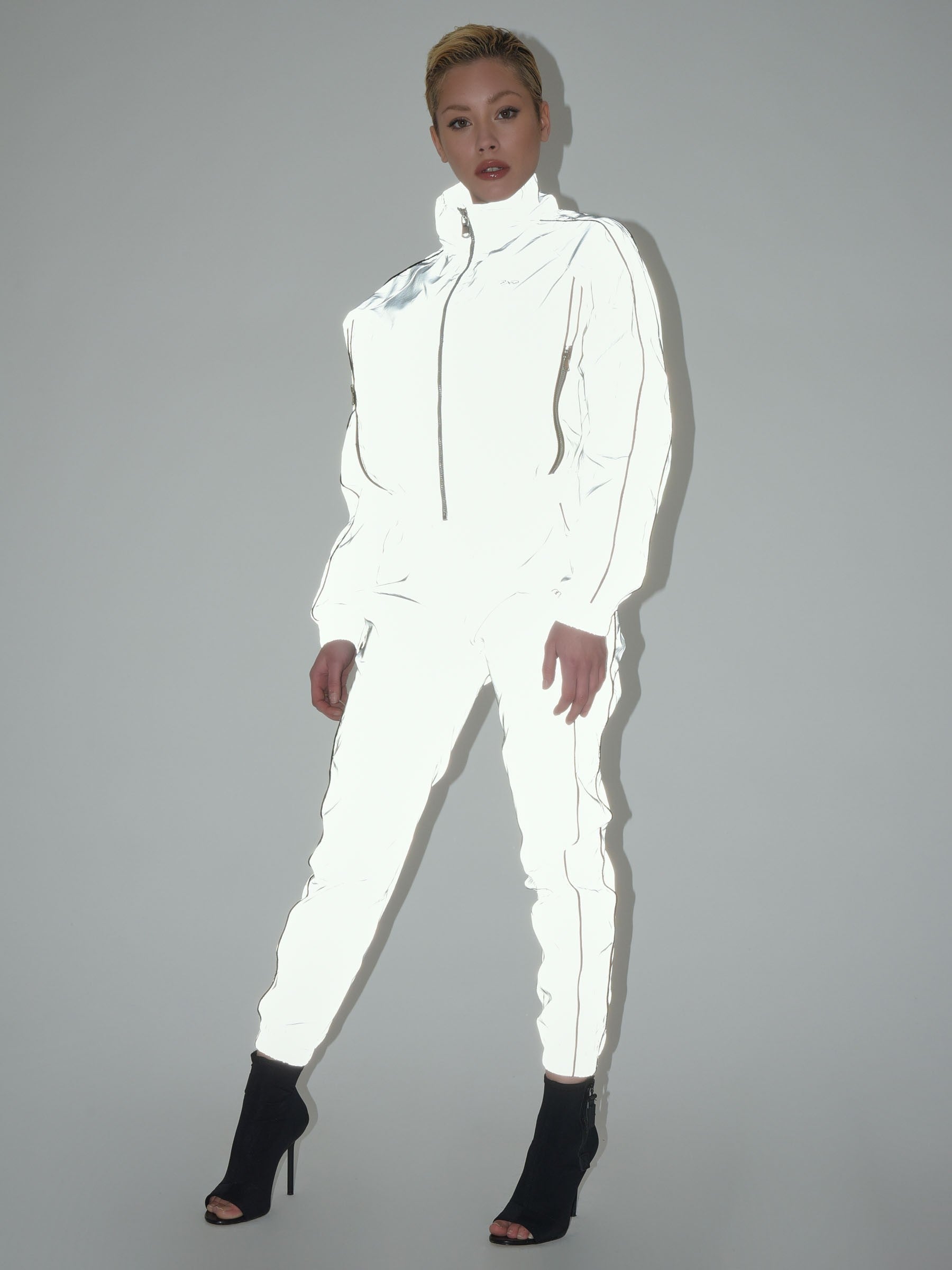 Veste oversize élastiquée col montant réfléchissante avec piping