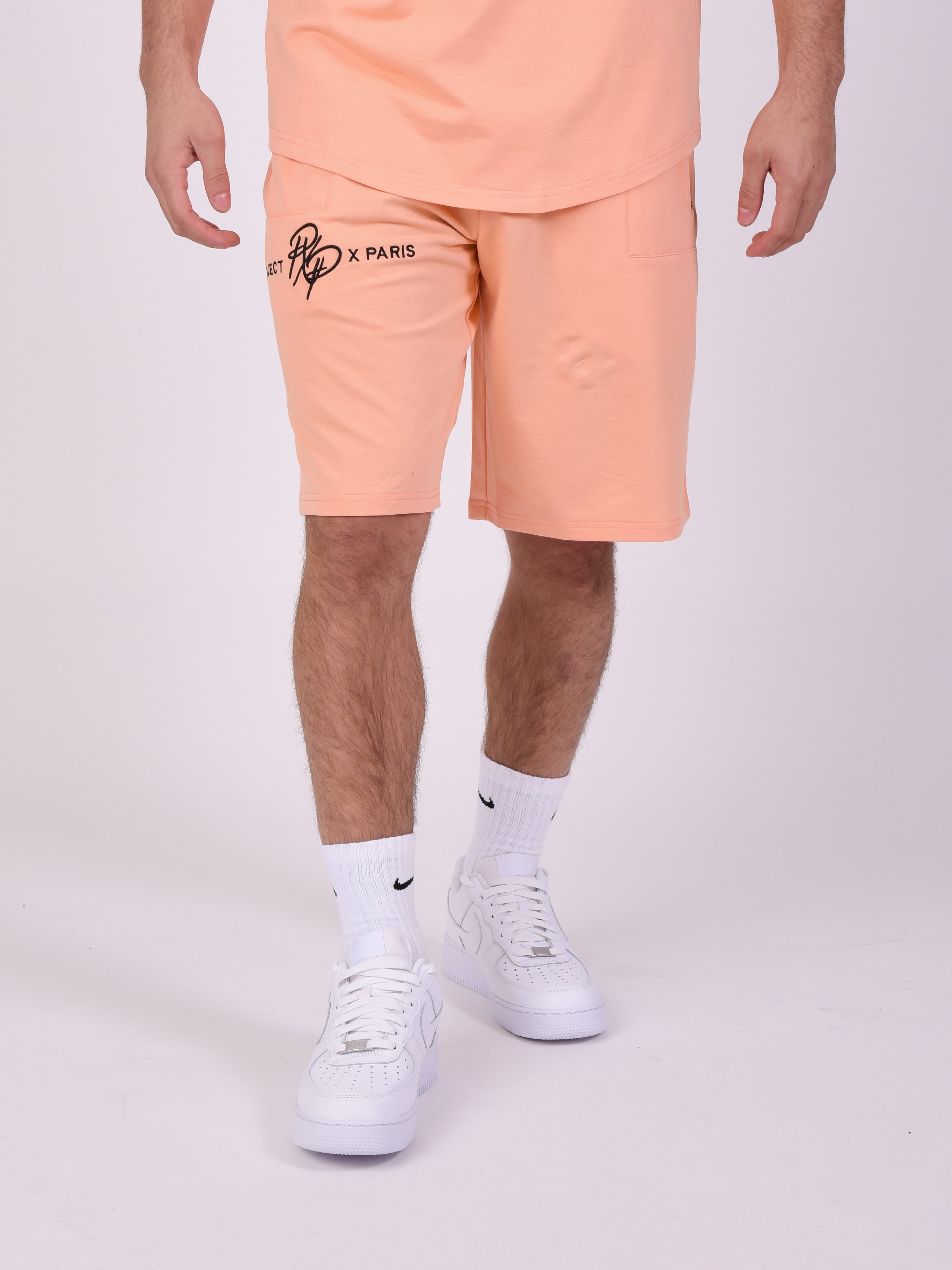 Short uni avec bande logo