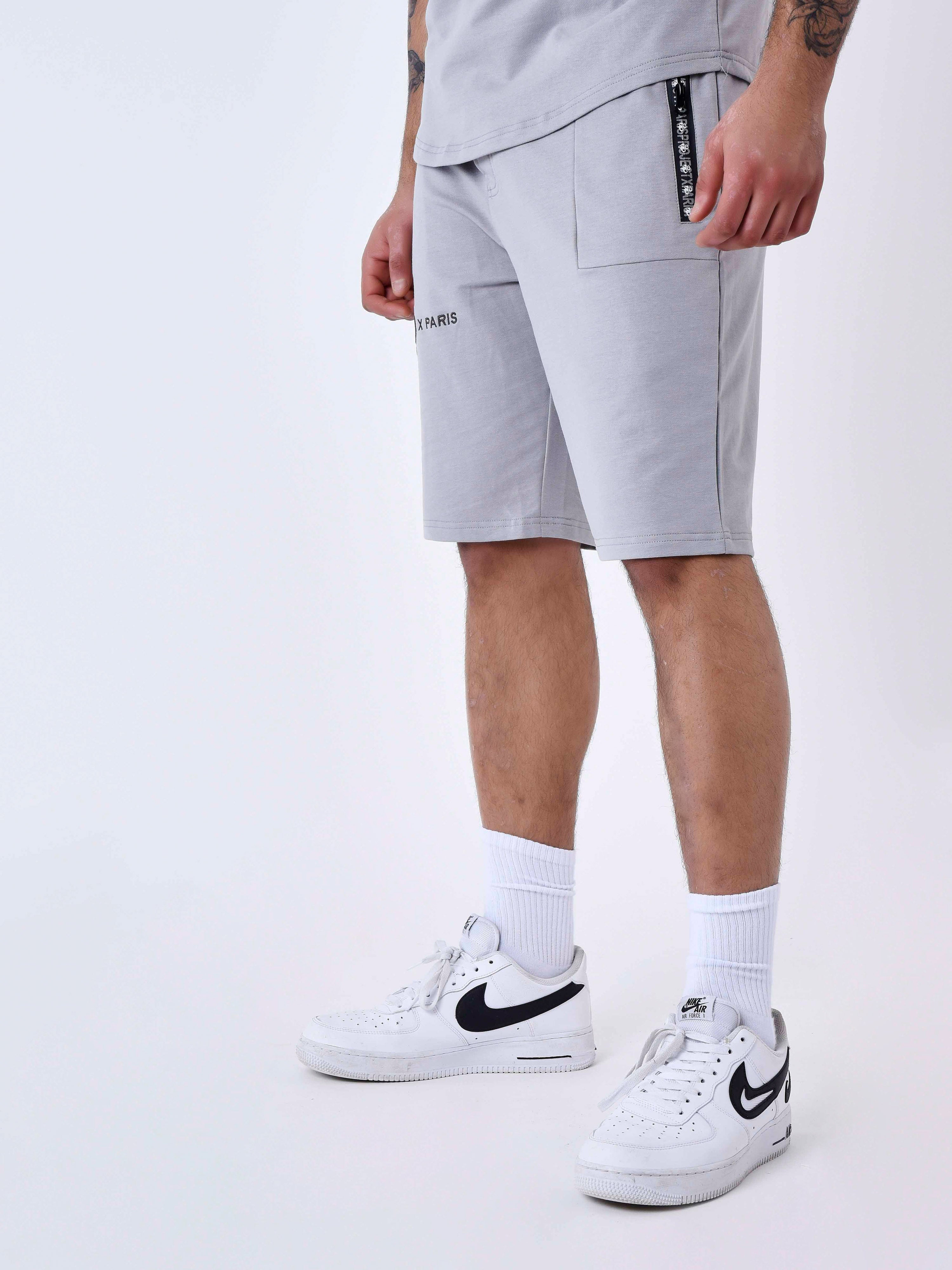 Short uni avec bande logo