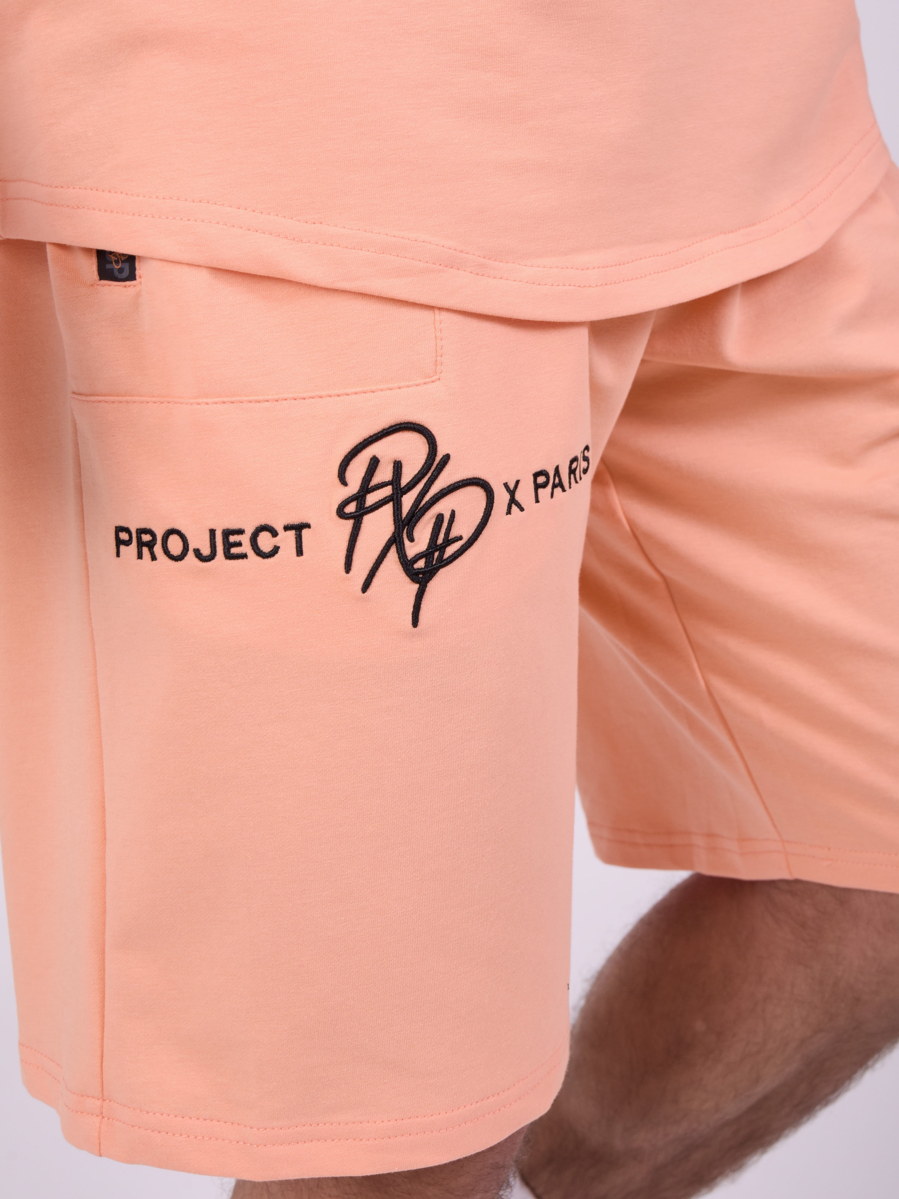 Short uni avec bande logo