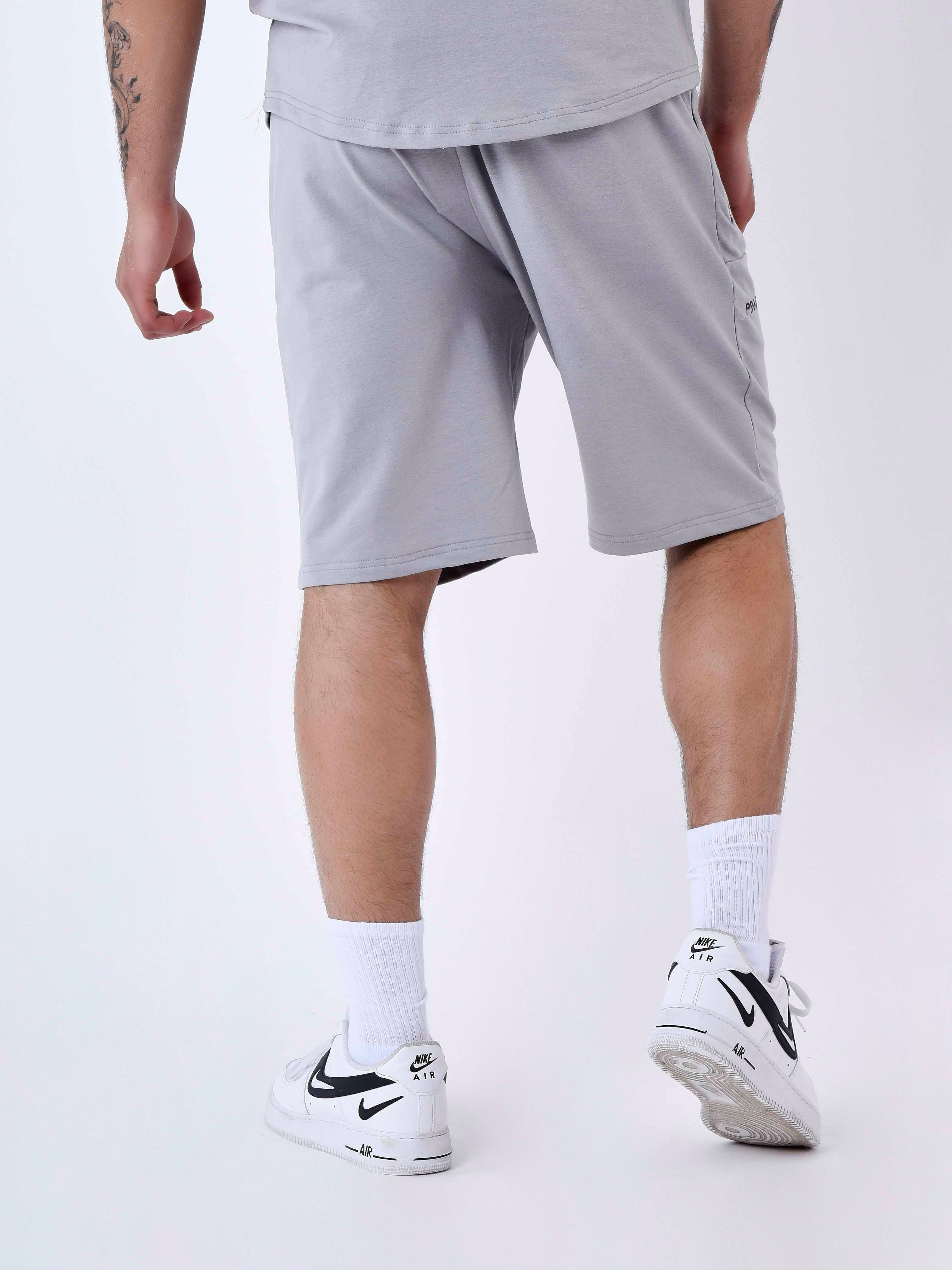 Short uni avec bande logo