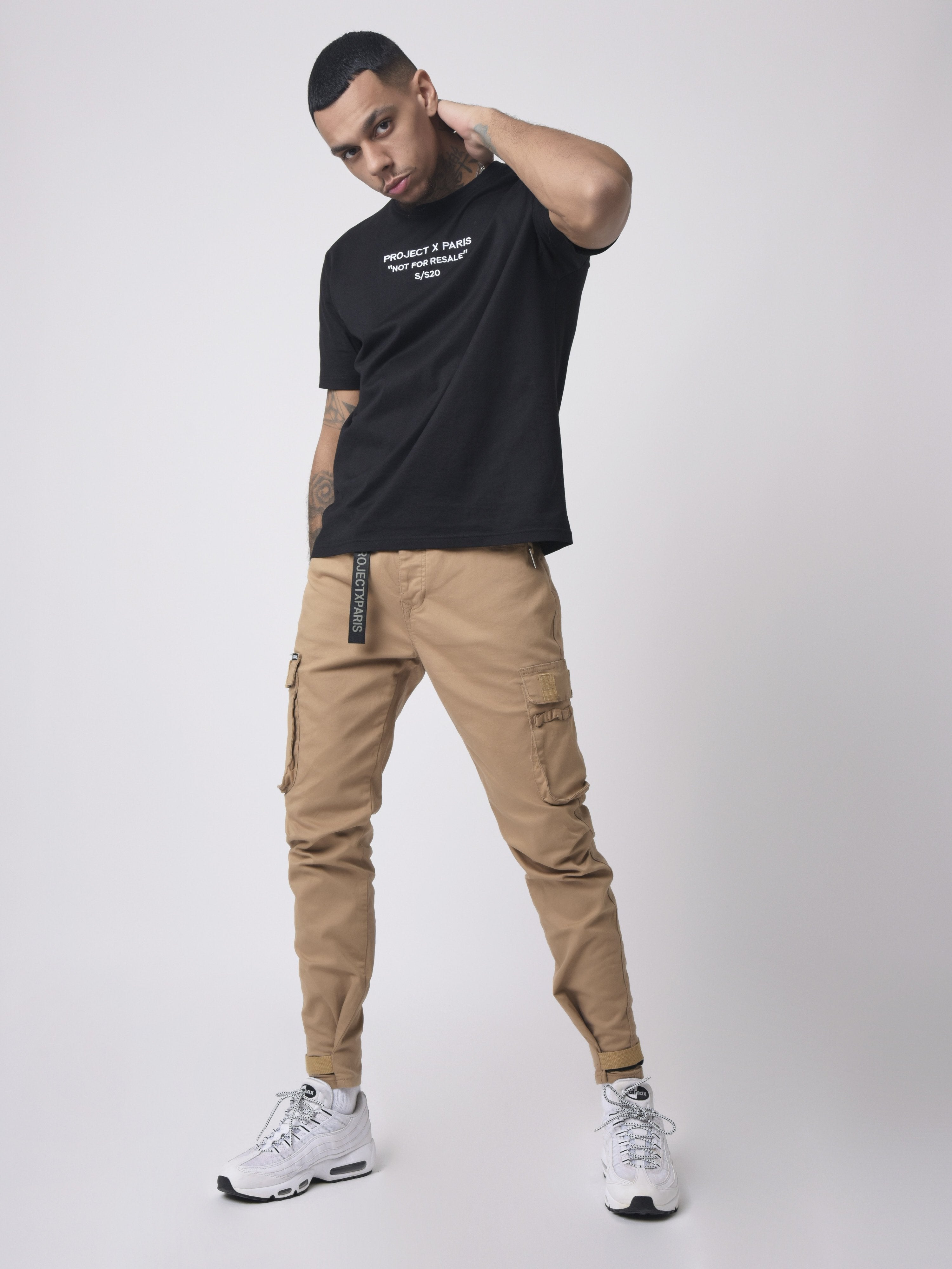 Jean Cargo poches et sangle de resserrement en bas