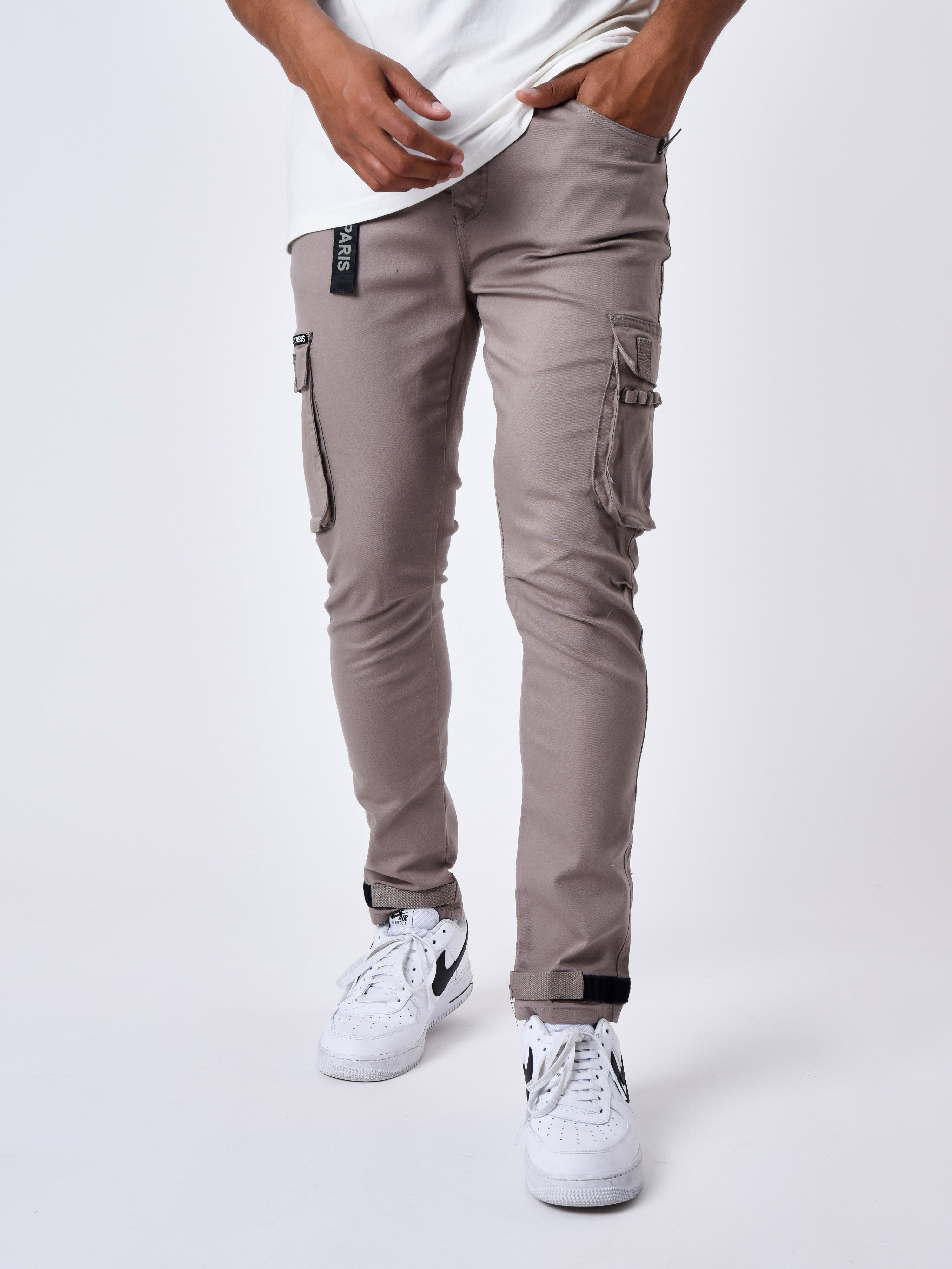 Jean Cargo poches et sangle de resserrement en bas