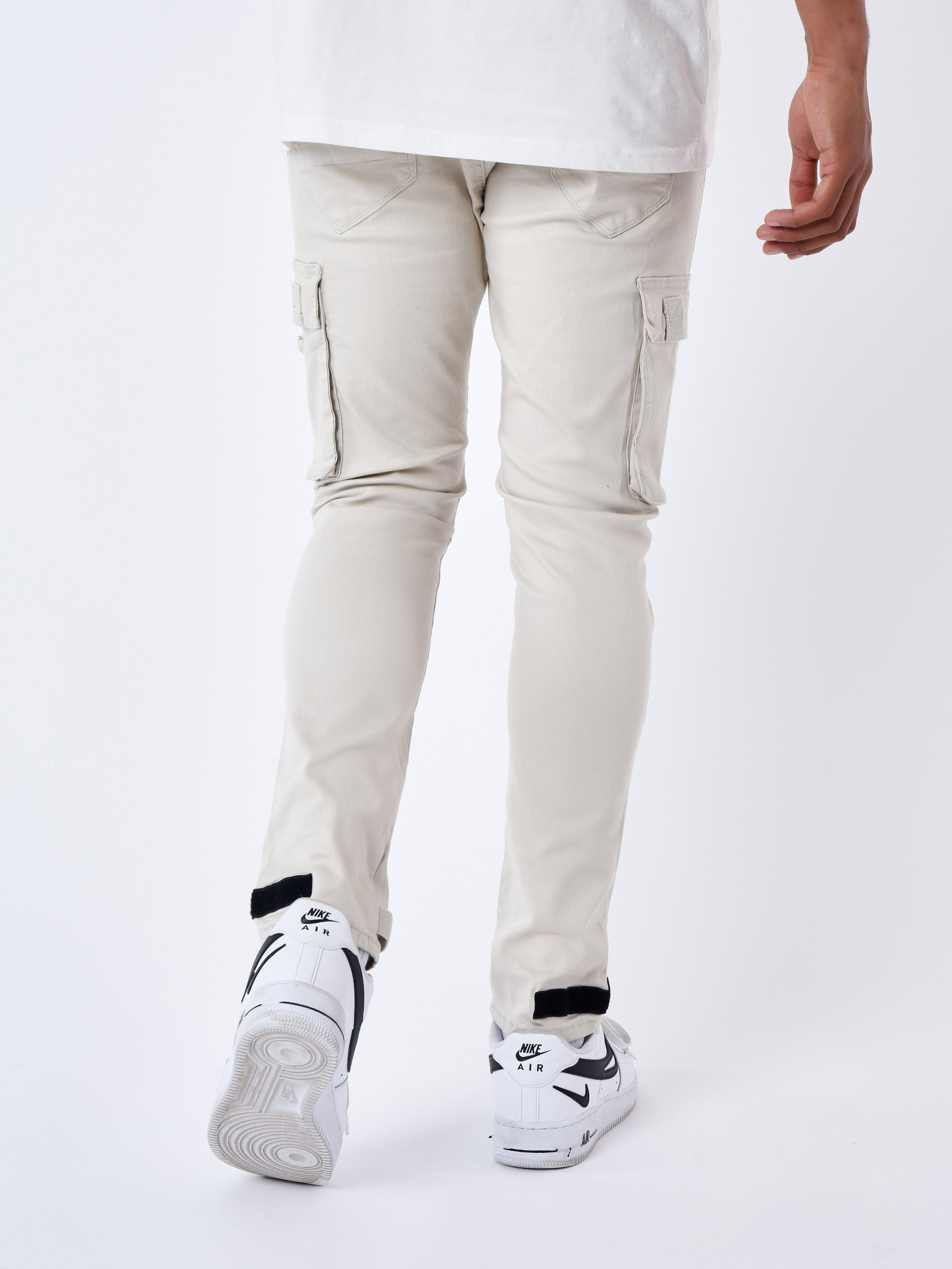 Jean Cargo poches et sangle de resserrement en bas