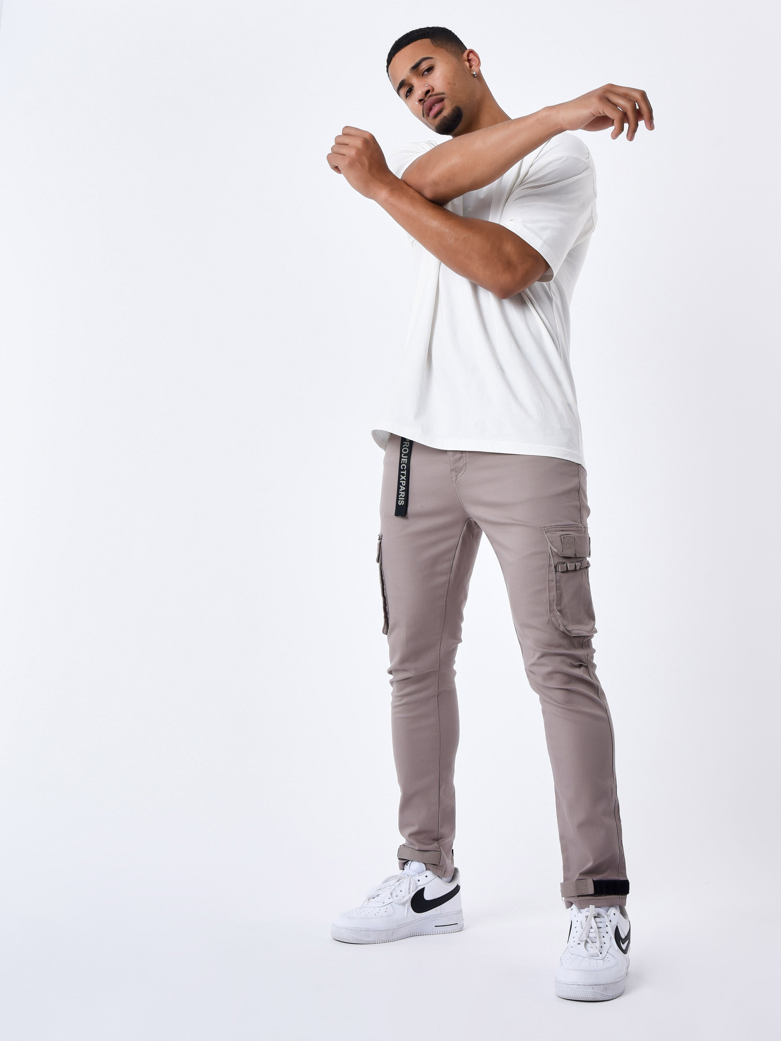 Jean Cargo poches et sangle de resserrement en bas